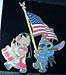 Stitch waves the American flag.